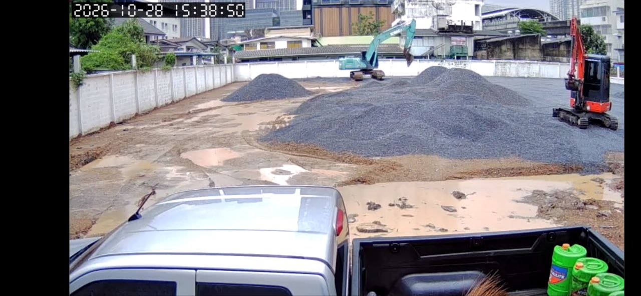 Actual construction site on 28 October 2026 with gravel deliveries and excavators