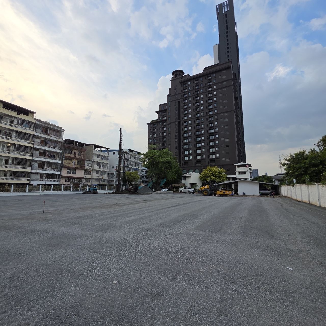 Actual 101 Racquet Club site on 31 October 2026, showing the levelled gravel surface and construction machinery